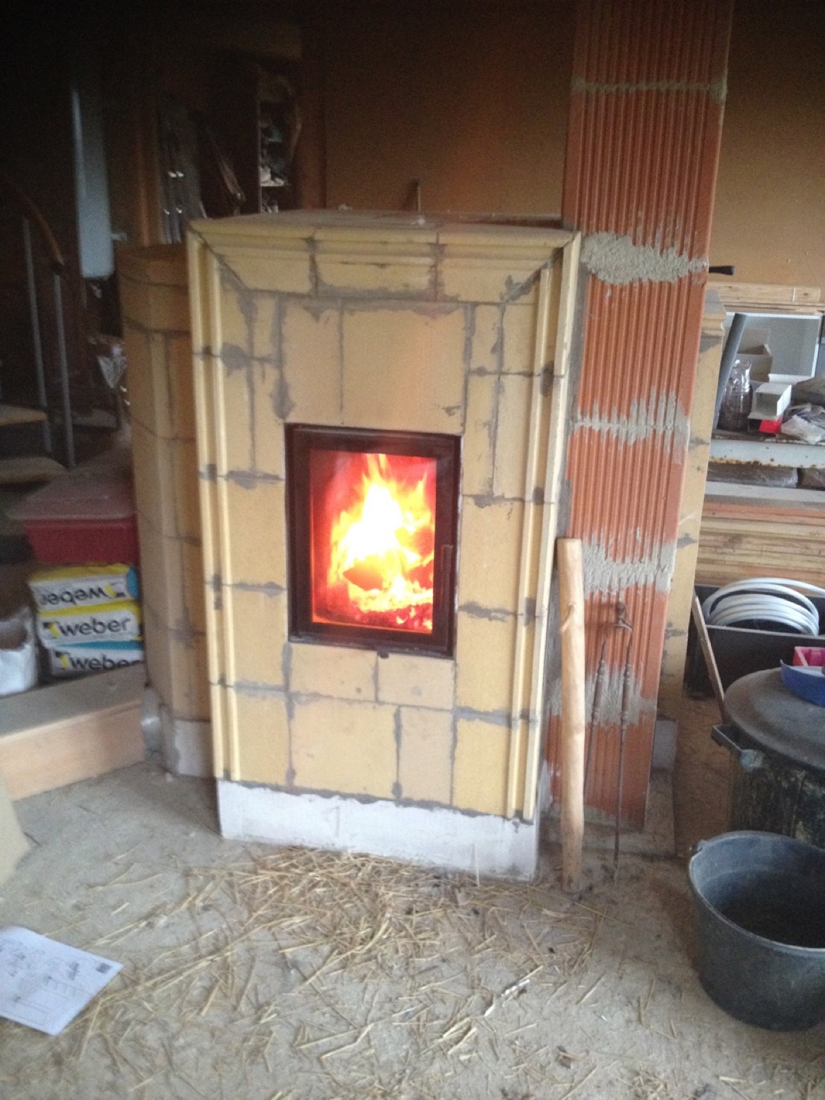 Moulded bricks and first fire, in the middle of the build