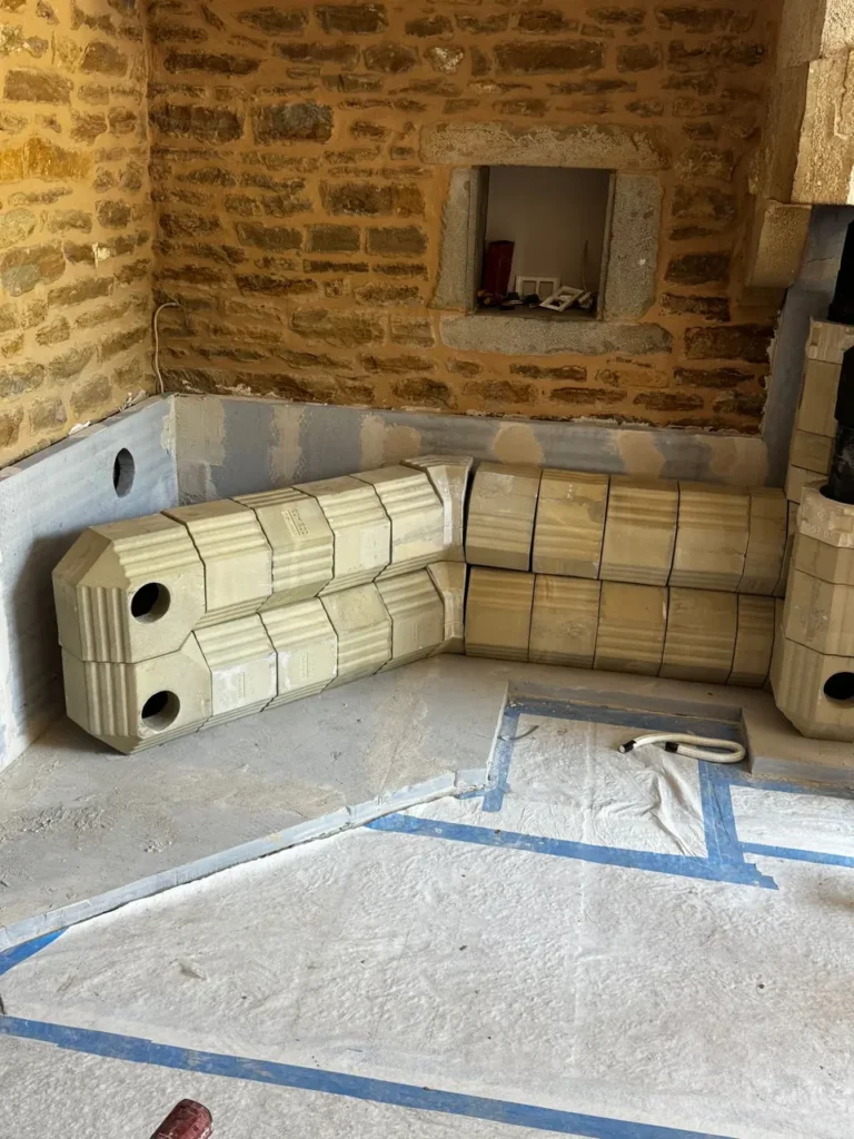 Smoke channels — Inside the old fireplace, a masonry heater